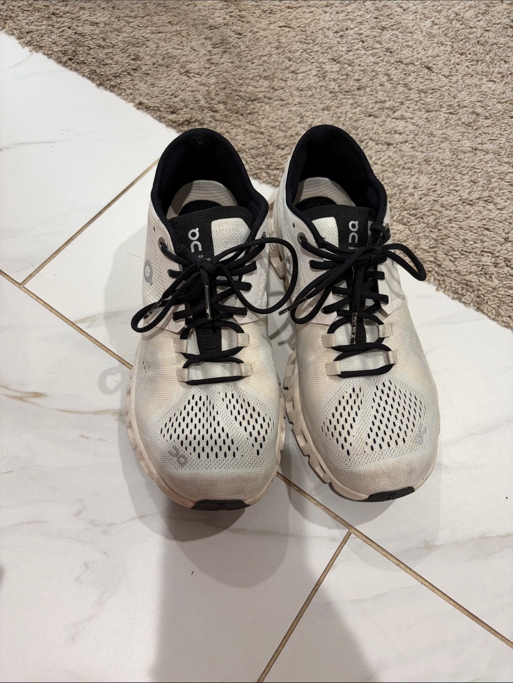 On Running White and Black Running Shoes